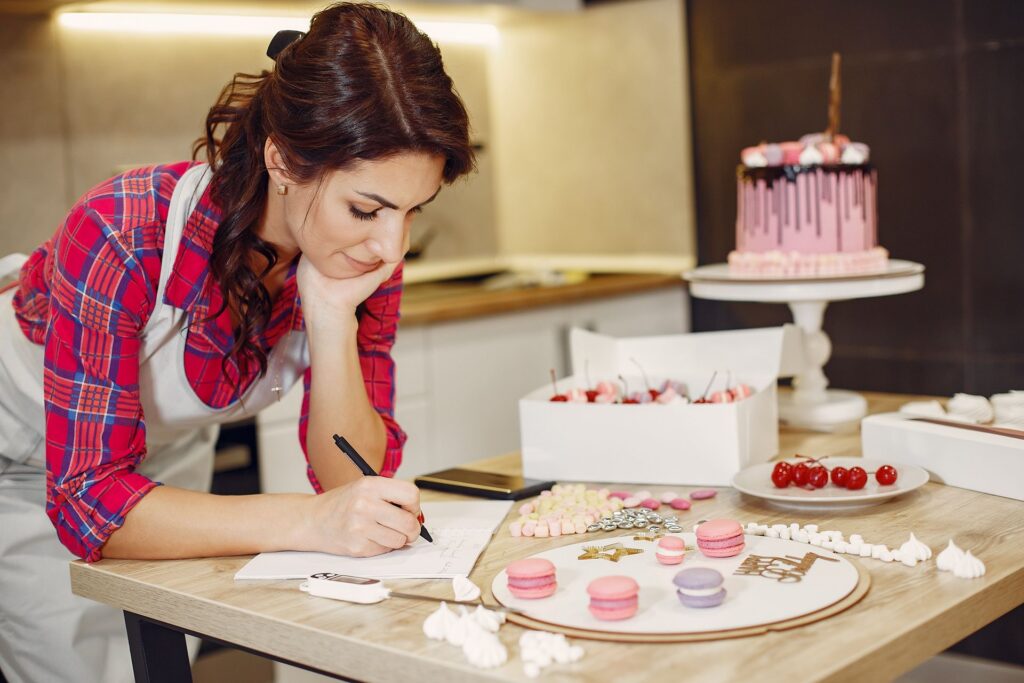 Creative business owner working out her VAT